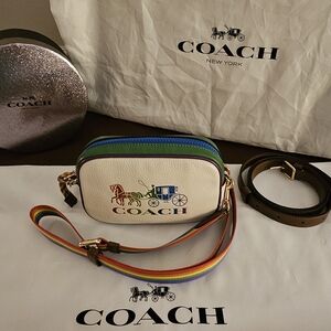 This is a Coach Jes Convertible Belt Bag with Rainbow Horse and Carriage